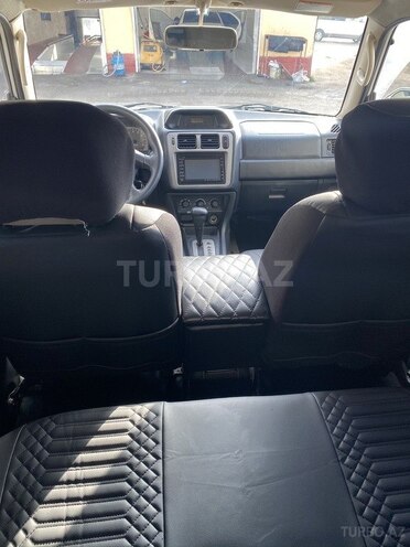 Mitsubishi Pajero io 2004, 210,000 km - 2.0 l - Bakı