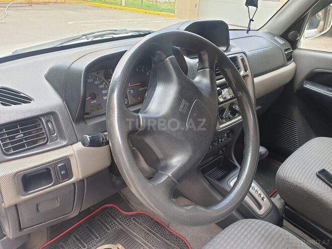 Mitsubishi Pajero io 1999, 252,000 km - 1.8 л - Bakı