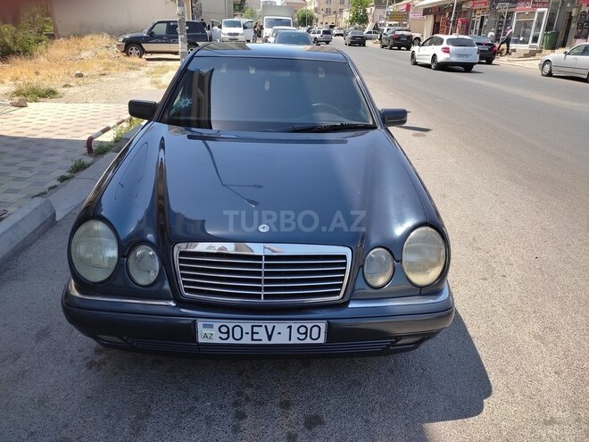 Mercedes E 220 1998, 306,657 km - 2.2 l - Bakı
