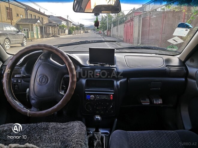 Opel Astra 1997, 300,000 km - 1.6 l - Qusar