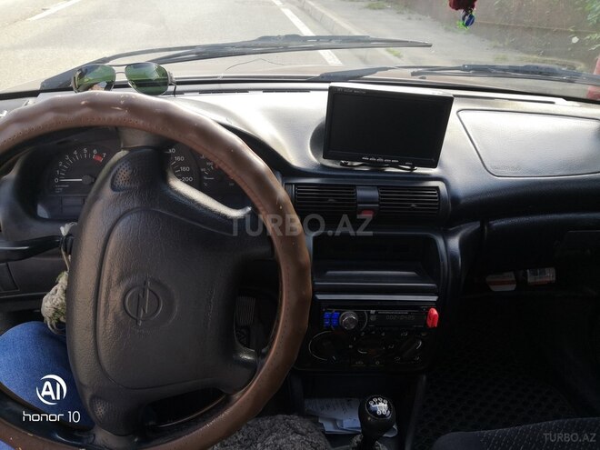 Opel Astra 1997, 300,000 km - 1.6 l - Qusar