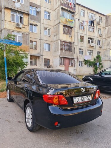 Toyota Corolla 2009, 197,000 km - 1.6 l - Bakı