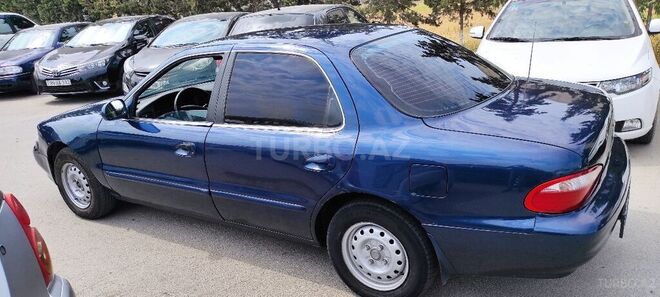 Kia Clarus 1997, 400,000 km - 2.0 l - Sumqayıt