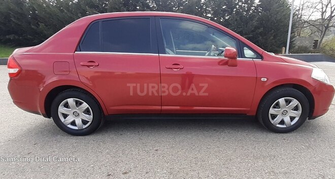 Nissan Tiida 2006, 147,000 km - 1.6 л - Quba
