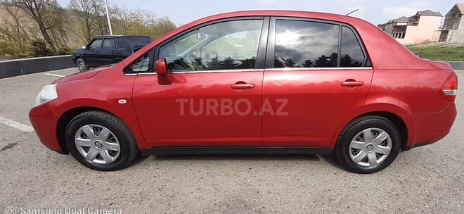Nissan Tiida 2006, 147,000 km - 1.6 л - Quba