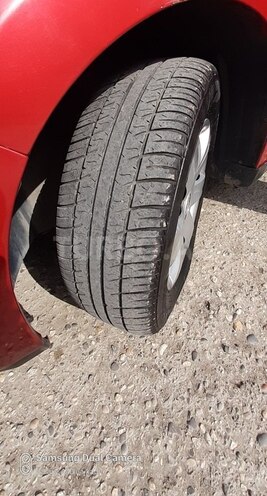 Nissan Tiida 2006, 147,000 km - 1.6 л - Quba