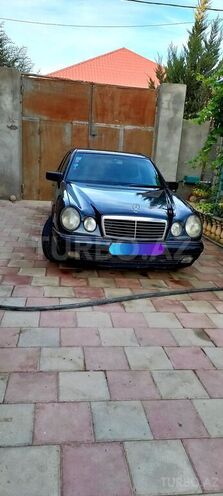 Mercedes E 230 1997, 253,648 km - 2.3 l - Bakı