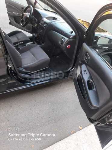 Nissan Sunny 2010, 176,000 km - 1.6 l - Qax