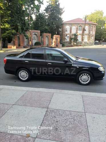 Nissan Sunny 2010, 176,000 km - 1.6 l - Qax