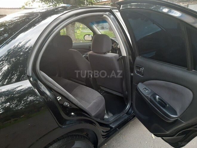 Nissan Sunny 2010, 176,000 km - 1.6 l - Qax