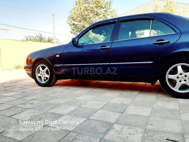 Mercedes E 230 1996, 330,622 km - 0.2 l - Bakı