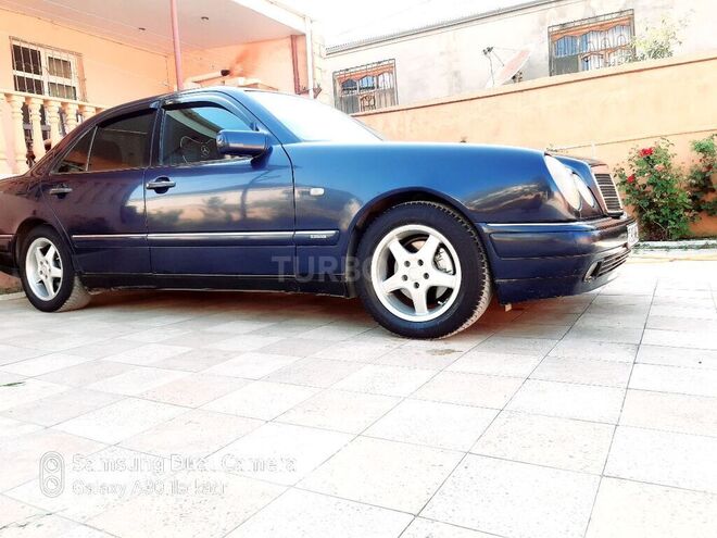 Mercedes E 230 1996, 330,622 km - 0.2 l - Bakı