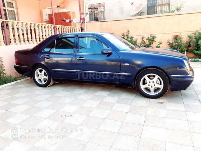 Mercedes E 230 1996, 330,622 km - 0.2 l - Bakı