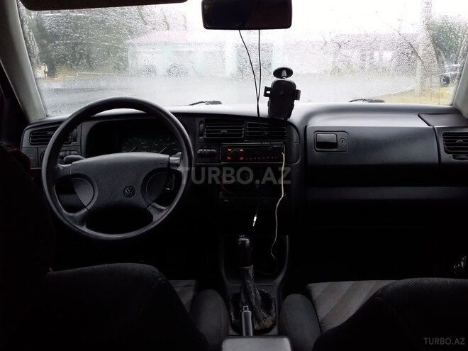 Volkswagen Golf 1993, 12,345 km - 1.8 л - Qax