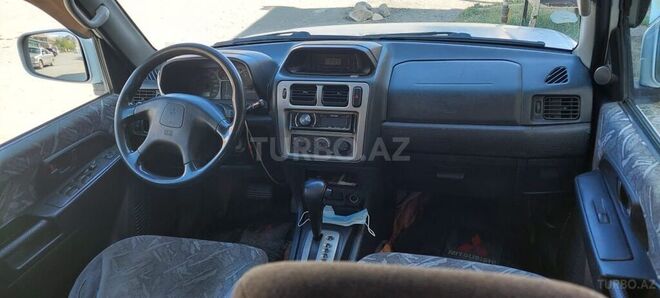 Mitsubishi Pajero io 1999, 301,202 km - 1.8 l - Gəncə