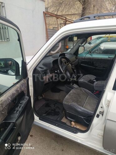 Mitsubishi Pajero io 1998, 265,268 km - 1.8 l - Bakı