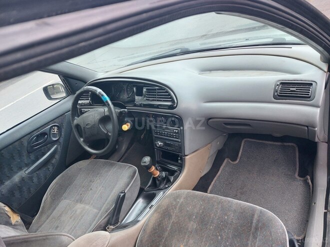 Ford Mondeo 1993, 524,521 km - 2.0 l - Qax