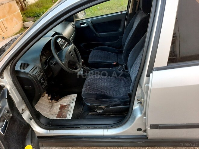 Opel Astra 1998, 452,154 km - 1.6 l - Qusar