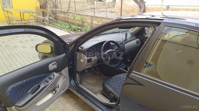Nissan Sunny 2003, 209,000 km - 1.6 l - Qusar