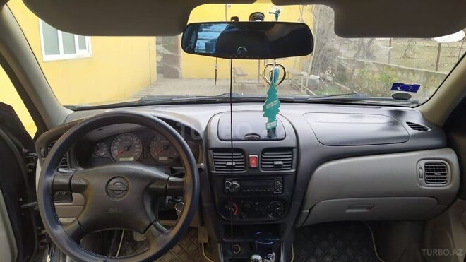 Nissan Sunny 2003, 209,000 km - 1.6 l - Qusar
