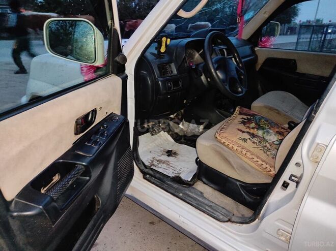 Mitsubishi Pajero io 2002, 258,078 km - 2.0 л - Şirvan