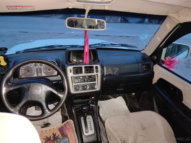Mitsubishi Pajero io 2002, 258,078 km - 2.0 л - Şirvan