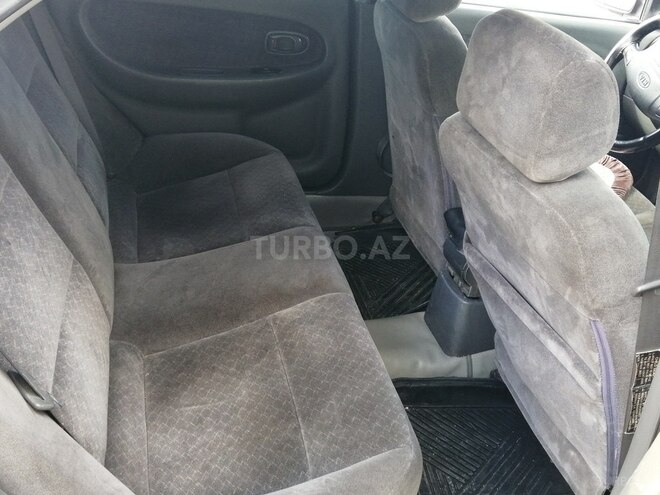 Kia  2002, 260,000 km - 1.8 l - Bakı