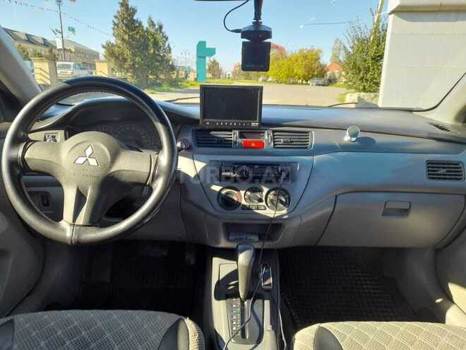 Mitsubishi Lancer 2006, 345,000 km - 1.3 l - Quba