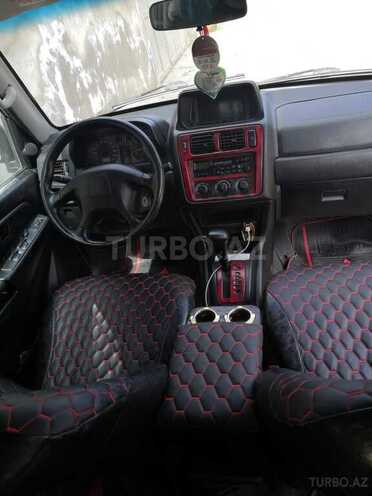 Mitsubishi Pajero io 2001, 330,000 km - 2.0 l - Bakı