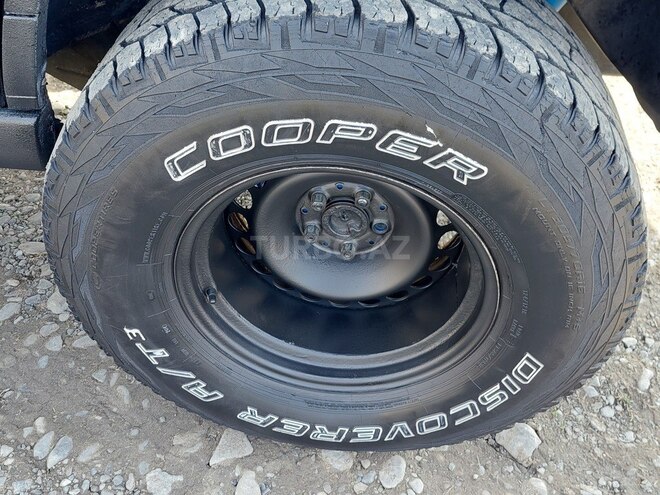 Jeep Grand Cherokee 1995, 999,999 km - 4.0 l - Qax