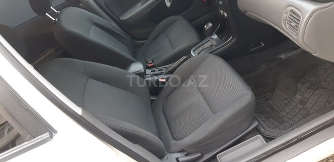 Nissan Sunny 2010, 214,000 km - 1.6 l - Bakı