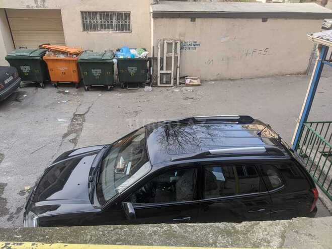 Hyundai Tucson 2009, 415,000 km - 2.7 л - Bakı