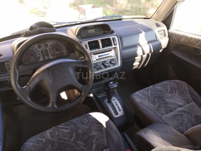 Mitsubishi Pajero io 1999, 265,000 km - 1.8 l - Bakı