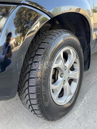 Hyundai Tucson 2008, 231,479 km - 2.0 л - Bakı