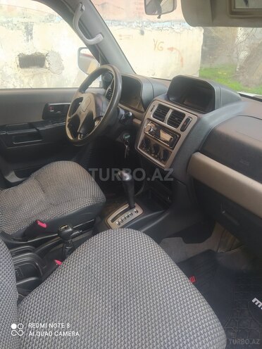 Mitsubishi Pajero io 1999, 274,539 km - 1.8 l - Bakı