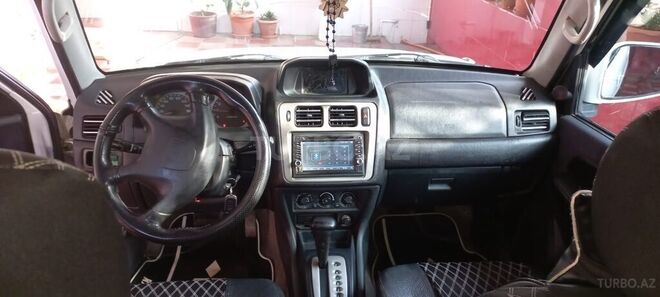 Mitsubishi Pajero io 1999, 285,000 km - 1.8 l - Bakı