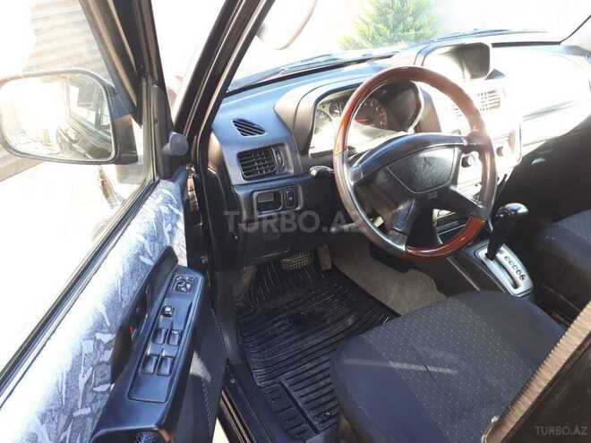 Mitsubishi Pajero io 1999, 321,000 km - 1.8 l - Bakı
