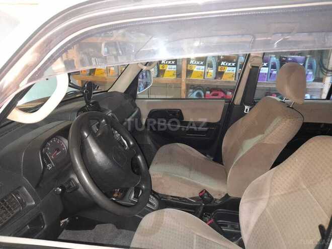 Mitsubishi Pajero io 2001, 203,000 km - 2.0 l - Yardımlı