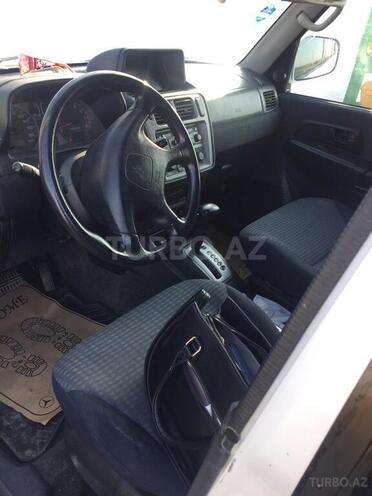 Mitsubishi Pajero io 2001, 223,033 km - 2.0 l - Beyləqan