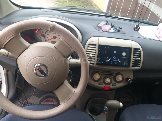 Nissan March 2007, 300,000 km - 1.2 л - Xudat