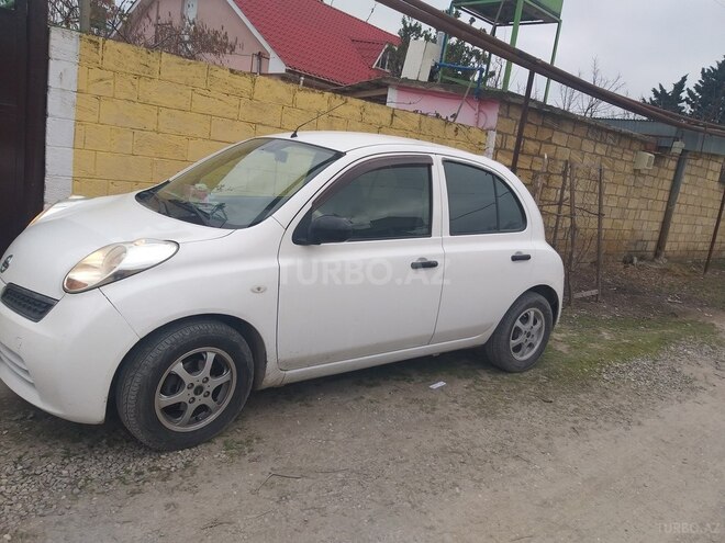Nissan March 2007, 300,000 km - 1.2 л - Xudat