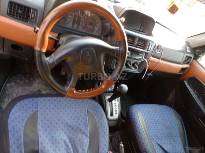 Mitsubishi Pajero io 1999, 100,000 km - 1.8 l - Bakı