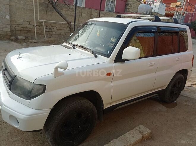 Mitsubishi Pajero io 1999, 100,000 km - 1.8 l - Bakı