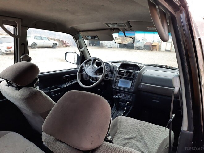 Mitsubishi Pajero io 2003, 400,000 km - 2.0 l - Bakı