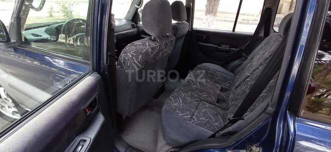 Mitsubishi Pajero io 1999, 190,000 km - 1.8 л - Bakı