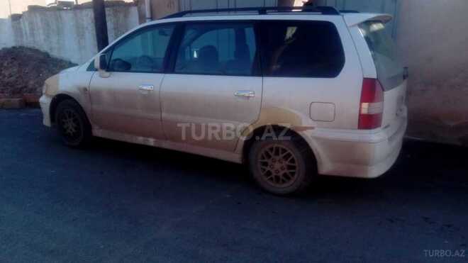 Mitsubishi Chariot 2001, 193,000 km - 2.4 л - Qusar
