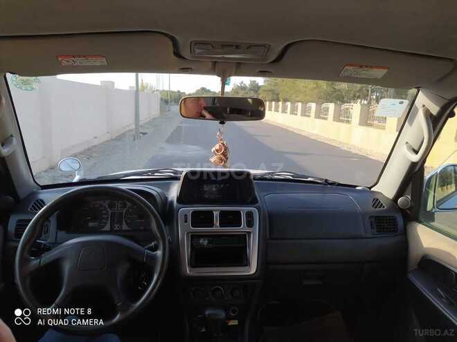 Mitsubishi Pajero io 2003, 275,000 km - 2.0 l - Bakı