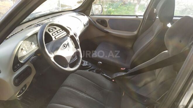 Chevrolet Niva 2005, 385,000 km - 1.7 l - Qusar