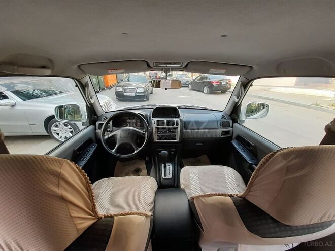 Mitsubishi Pajero io 1999, 250,000 km - 1.8 л - Bakı