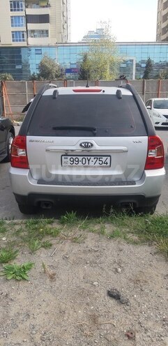 Kia Sportage 2009, 241,000 km - 2.0 l - Bakı
